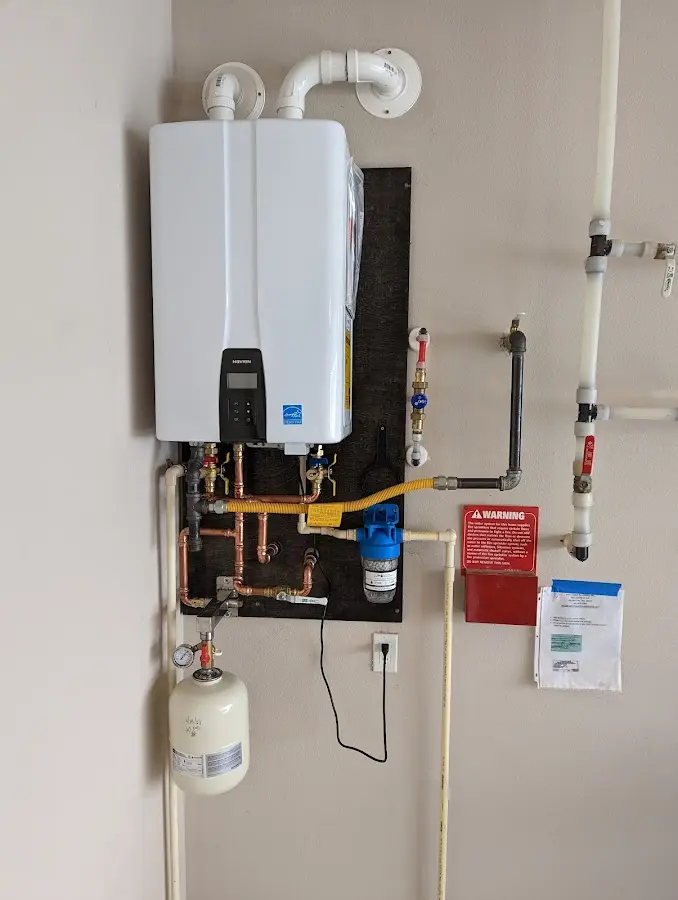 Professional plumber installing copper piping in a American Canyon home